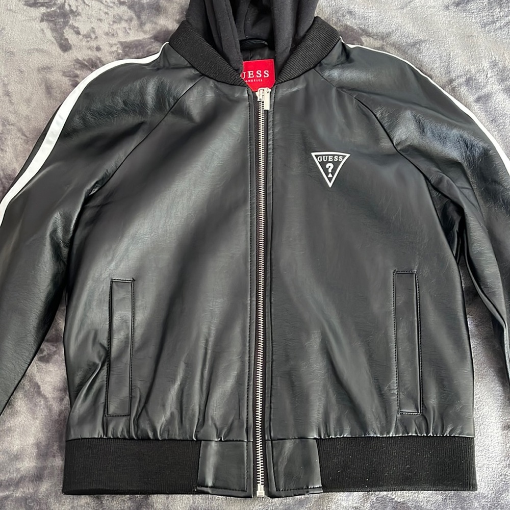 Black leather jacket w/ white and red stripes on the side, w/black hood/pockets.
